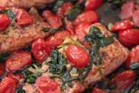Zesty Lemon Herb Salmon with Tomatoes and Spinach