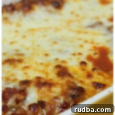 Baked Manicotti 4 Manicotti with meat sauce and cheese