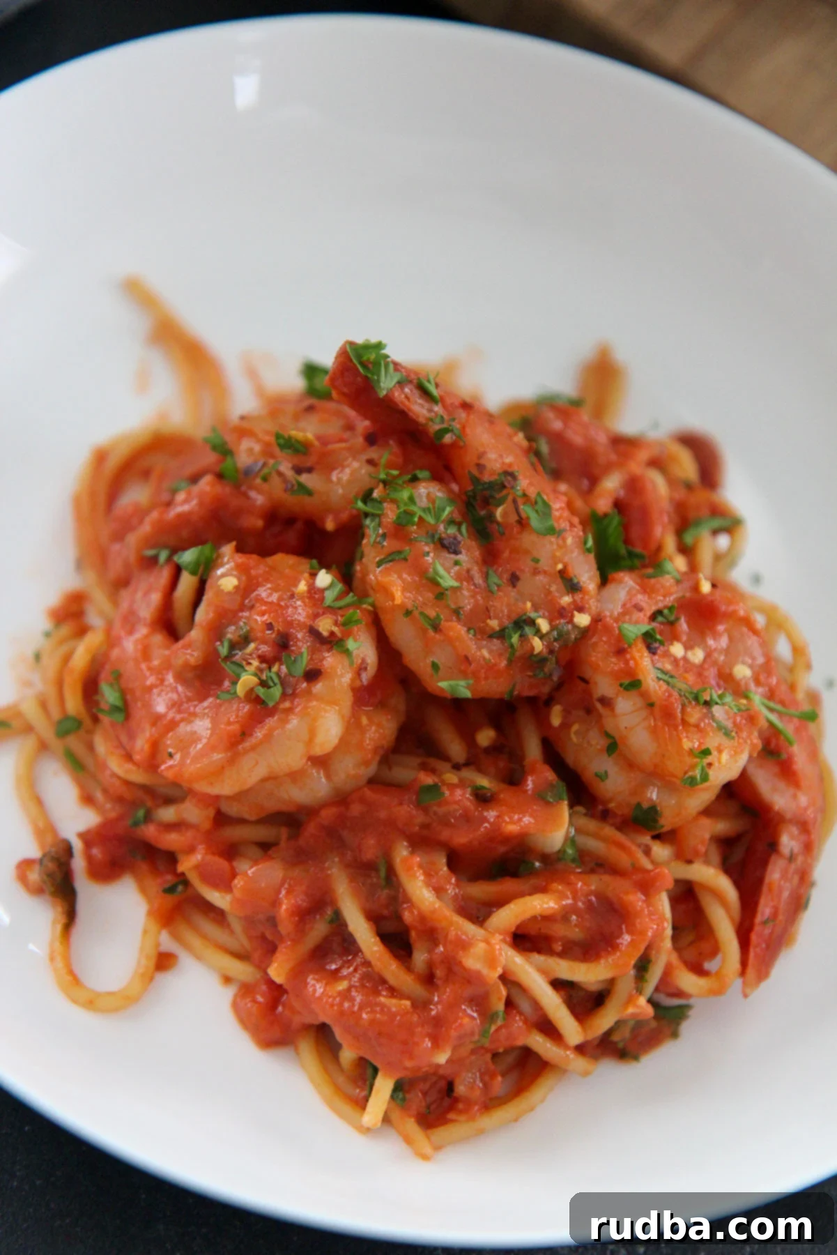 white bowl with seafood pasta up close 
