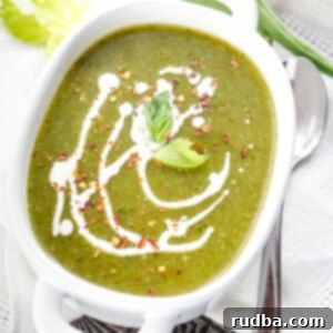 Vegan Green Detox Soup 4 vegan green detox soup with cream in a white bowl
