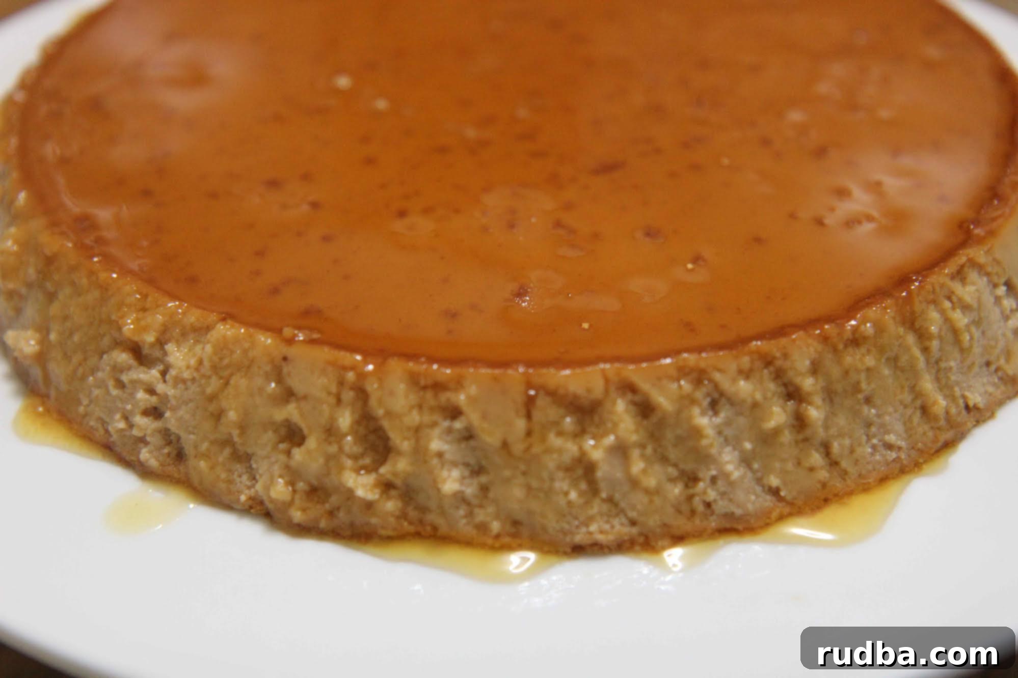 Rich and creamy Guava Flan topped with luscious caramel sauce, a perfect tropical dessert.