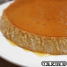Guava Paradise Flan 4 A perfectly set Guava Flan, ready to be enjoyed, showcasing a beautiful golden caramel layer.