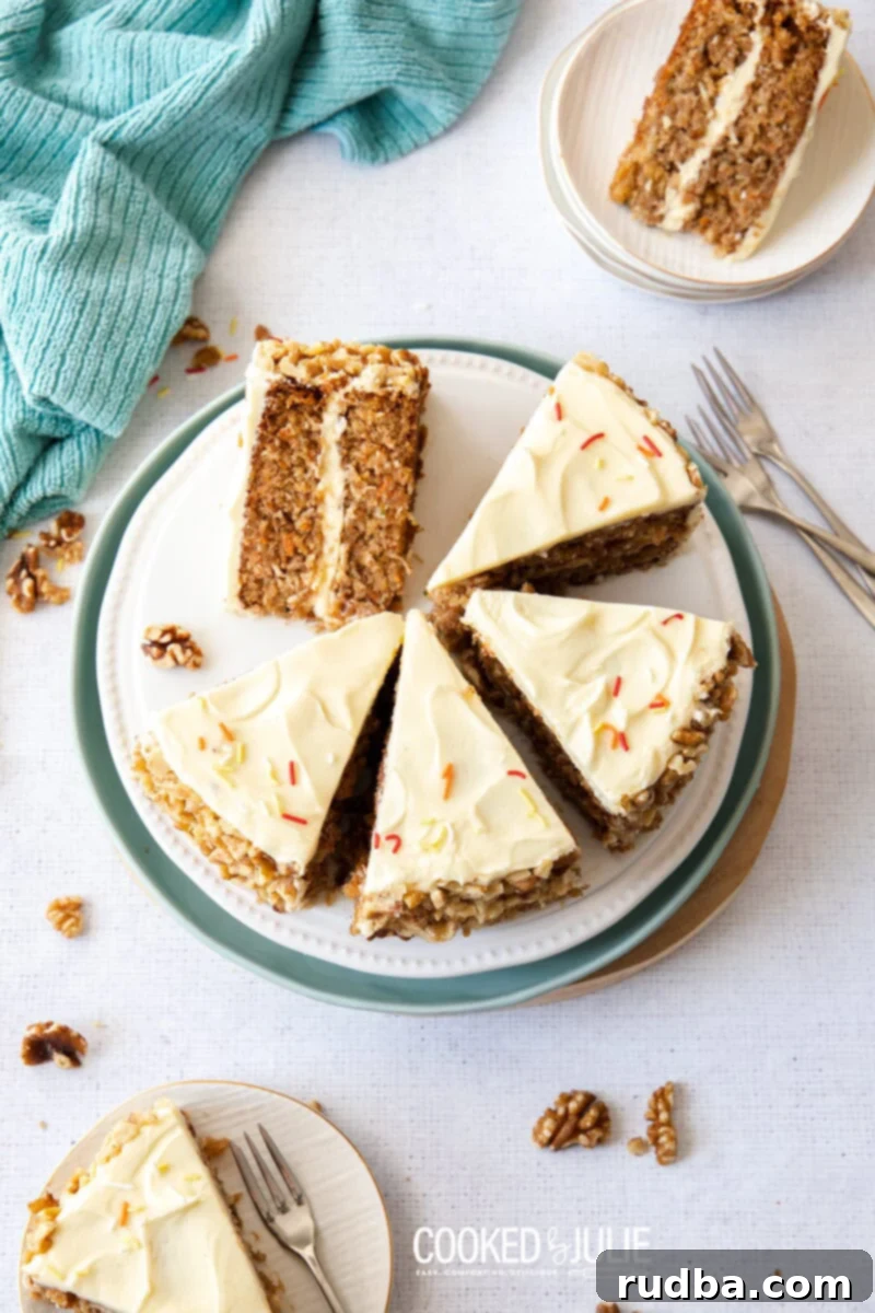 seven slices of carrot cake with three forks