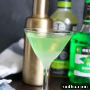 Emerald Apple Martini 4 green apple martini served in a chilled martini glass