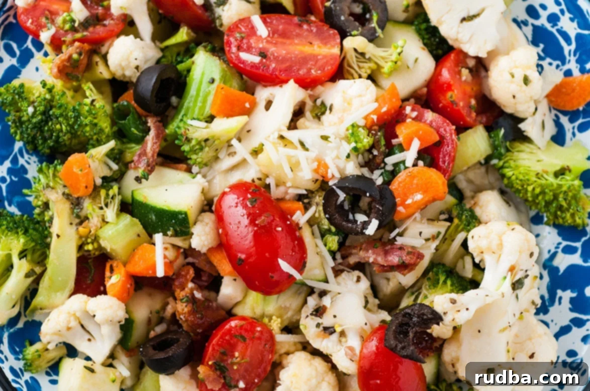 vegetable salad with homemade Italian dressing up close.