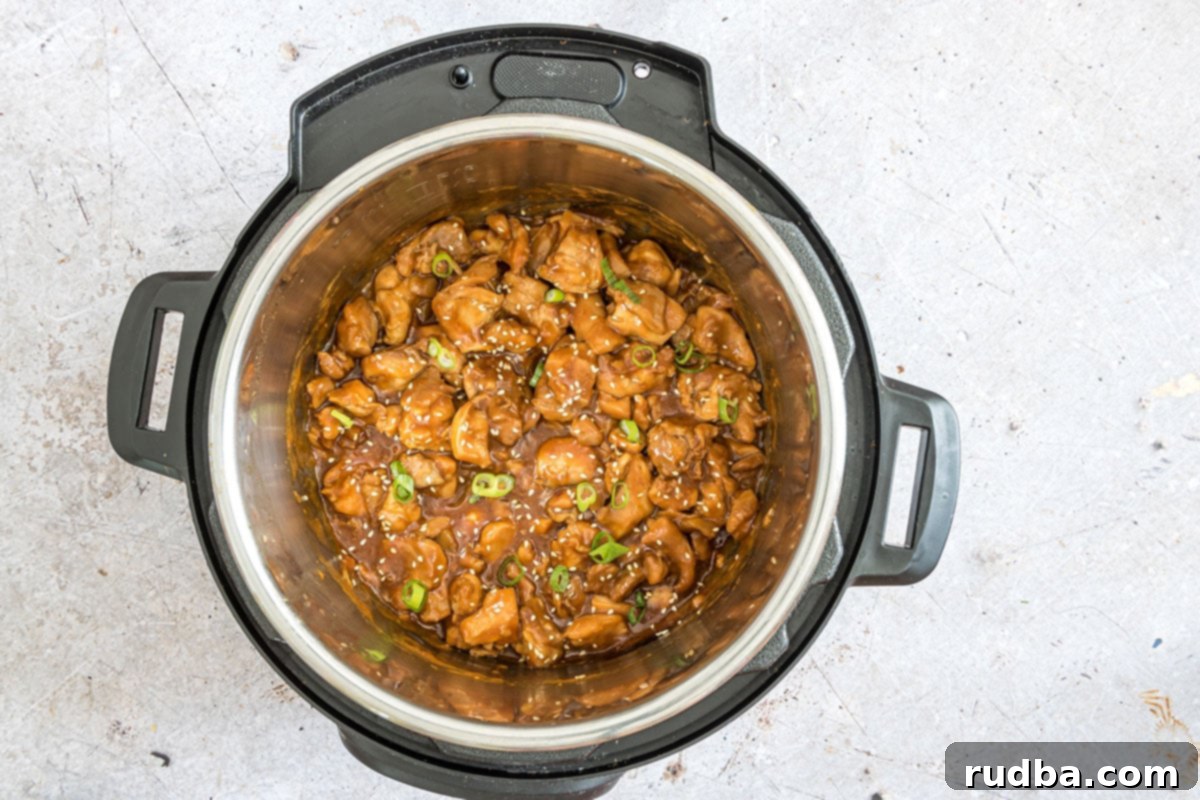 sesame chicken with scallions inside the instant pot.