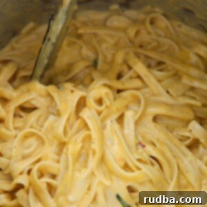 Creamy Instant Pot Pumpkin Fettuccine Alfredo 4 pumpkin fettuccine alfredo up close in the instant pot.