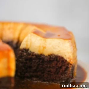 Impossible Chocoflan 2 sliced chocoflan on a plate up close.