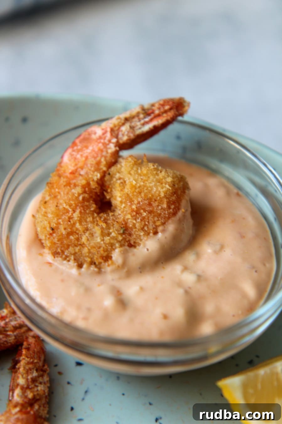 shrimp dipped in sauce. 