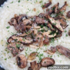 Decadent Truffle Mushroom Risotto 4 truffle mushroom risotto with parsley on top.