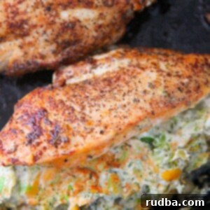 Cheesy Broccoli Stuffed Chicken 4 two broccoli cheese stuffed chicken breasts in a cast iron skillet.