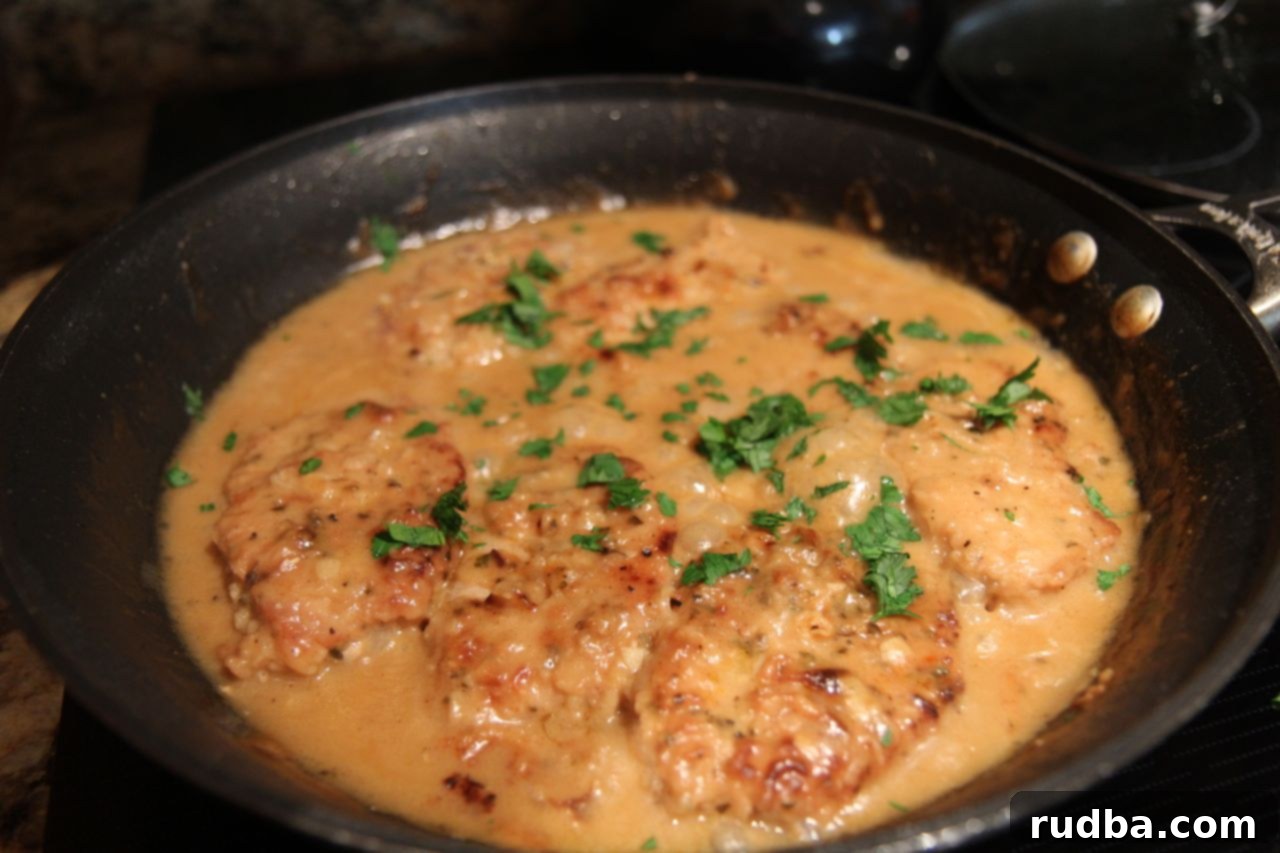 Smothered Pork Chops | Cooked by Julie