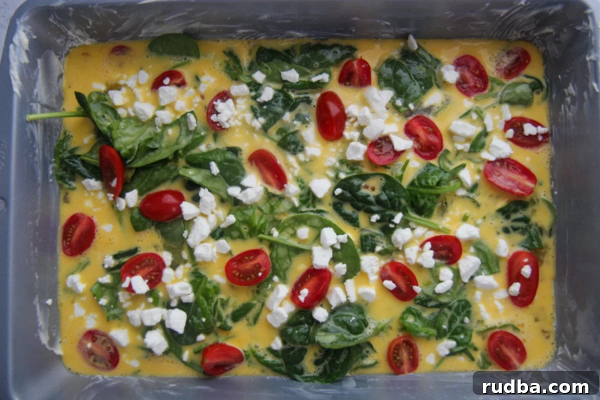 raw egg mixture in a 9x13 buttered baking dish. 