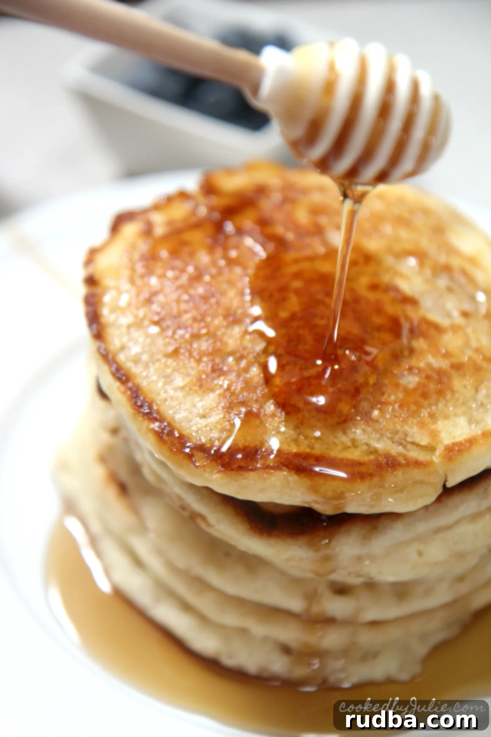 Honeycomb with original pancakes on a white plate 