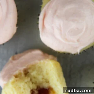Tropical Guava Cupcakes 6 4 guava cupcakes with frosting on top