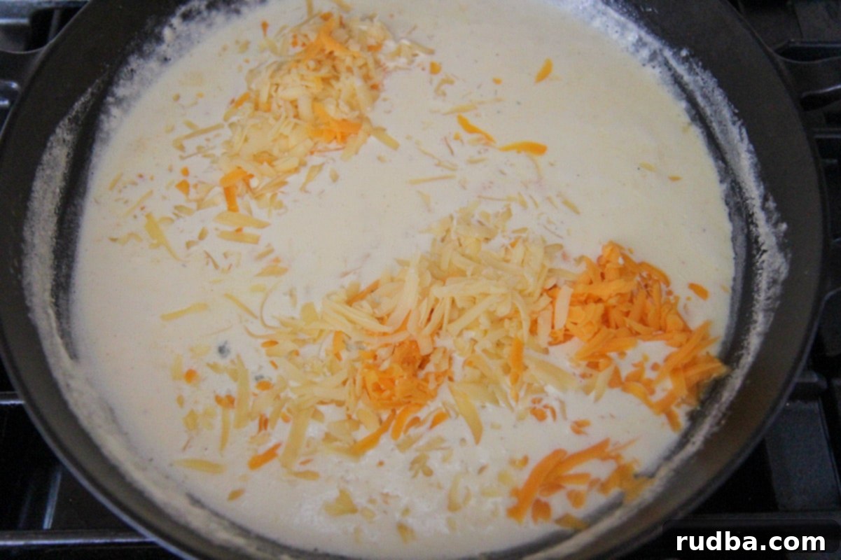 heavy cream and shredded cheese in a skillet.