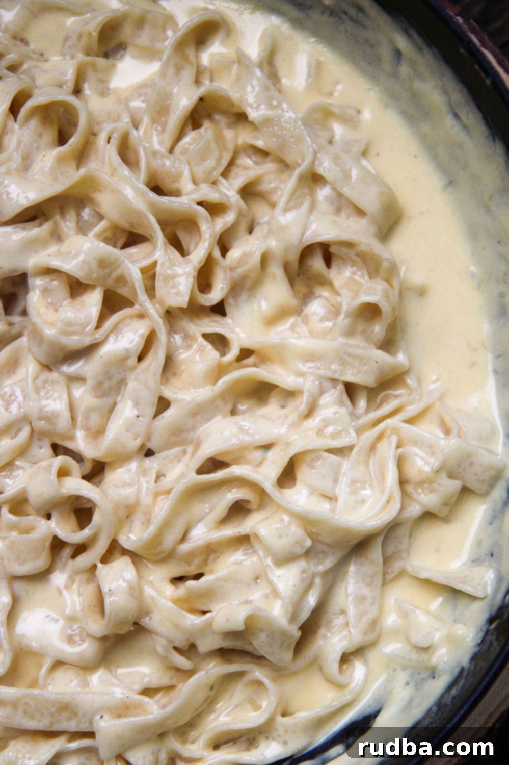 cheesy tagliatelle pasta up close. 