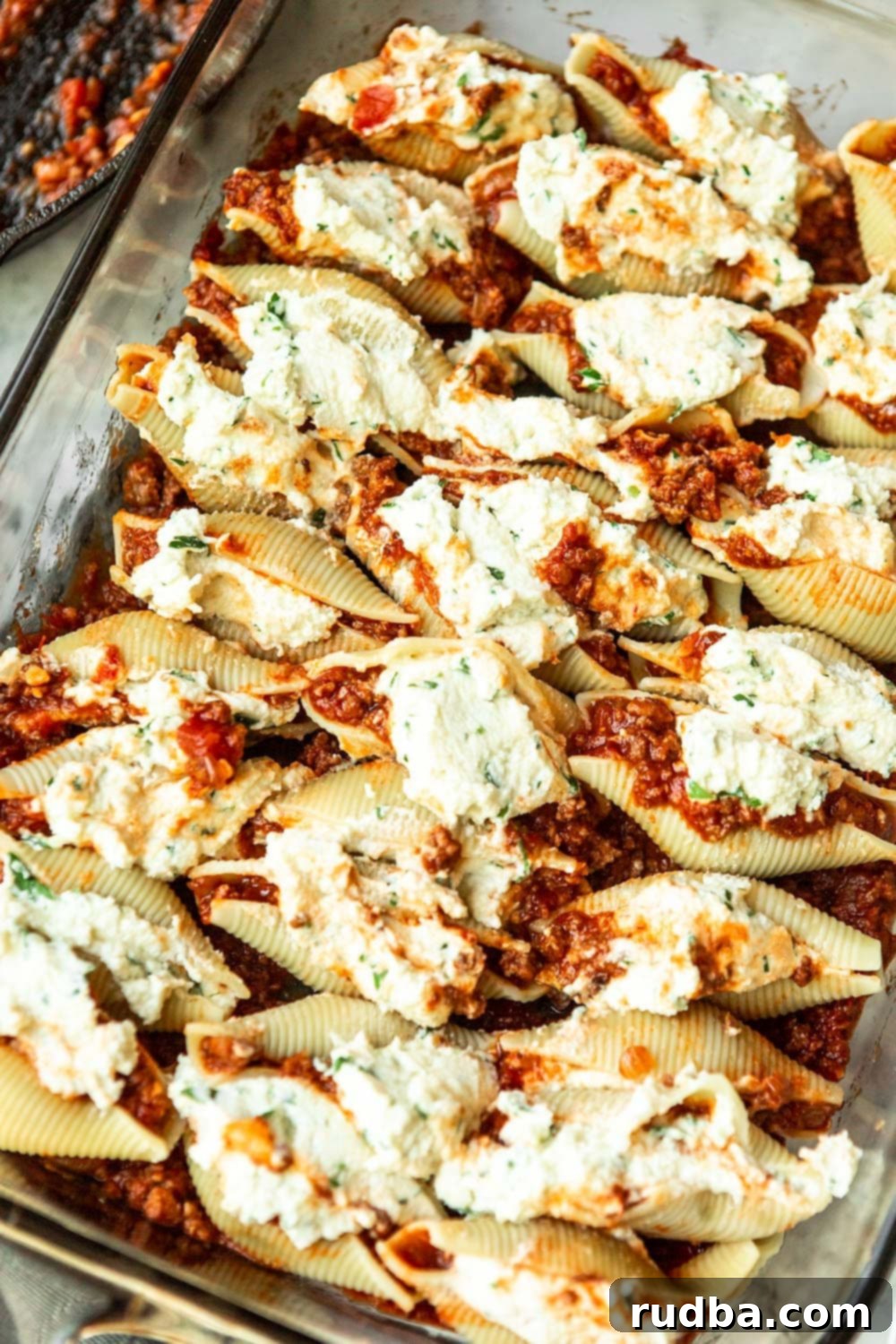 an entire casserole filled with meat sauce and stuffed shells. 