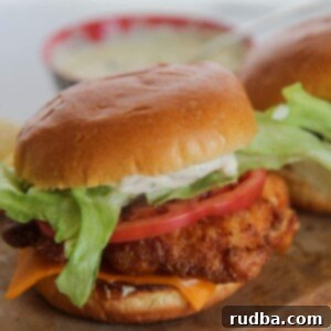 Close-up of a perfectly fried fish sandwich.