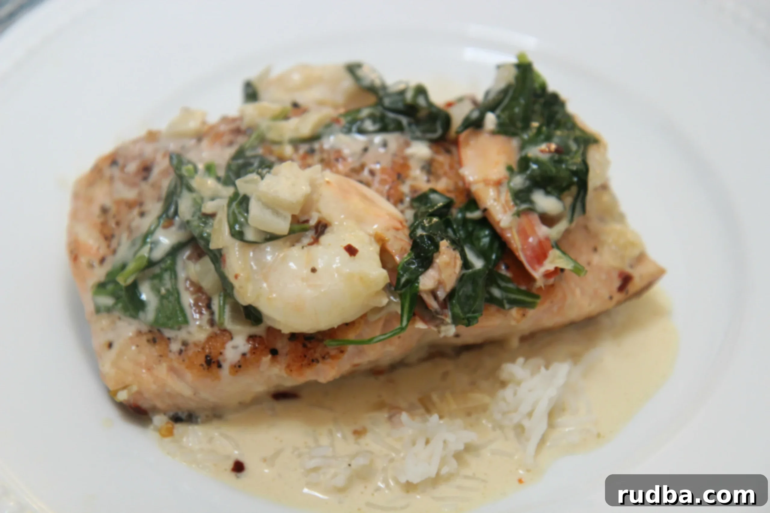 salmon and shrimp over white rice. 