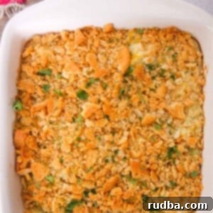 Southern Gold Squash Bake 2 Southern yellow squash casserole in a white baking dish.