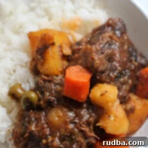 Havana's Fiery Oxtail 2 Rabo Encendido (Cuban Oxtail) served with white rice.
