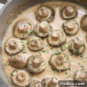 creamy garlic butter mushrooms in a skillet.