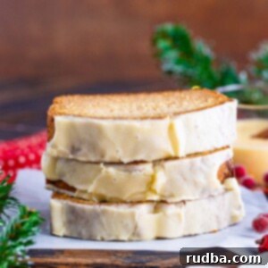 Festive Spiced Eggnog Bread 2 three eggnog bread slices stacked.