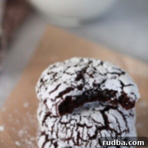 Chocolate Crinkle Cookies 2 three chocolate crinkle cookies.
