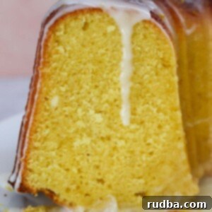 Sunshine Citrus Bundt 2 a slice of lemon bundt cake up close.