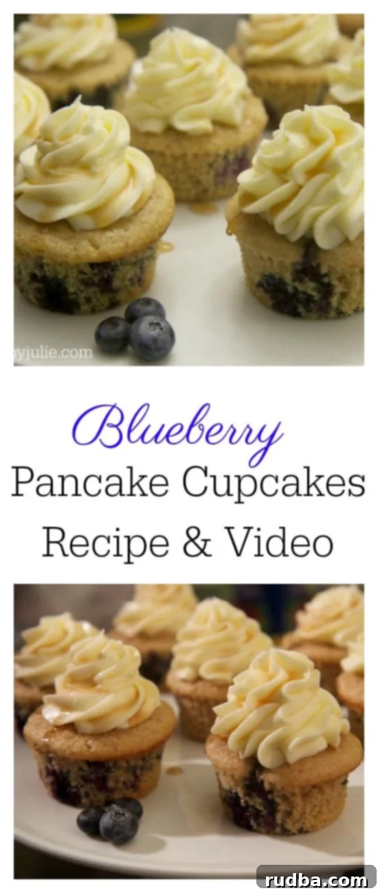 Close-up of a blueberry pancake cupcake with cream cheese frosting and fresh blueberries.