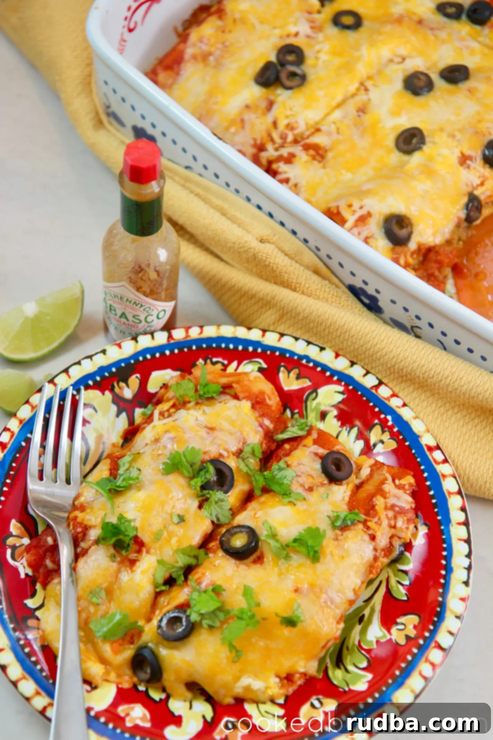 These cheesy beef enchiladas are the perfect party meal. Top with some hot sauce and lime