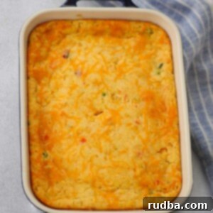 Creamy Cheesy Jalapeno Corn Bake 2 Cheesy jalapeno corn casserole in an 8x10 baking dish.