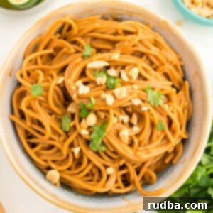 Fiery Peanut Noodles 2 Spicy peanut noodles in a bowl.