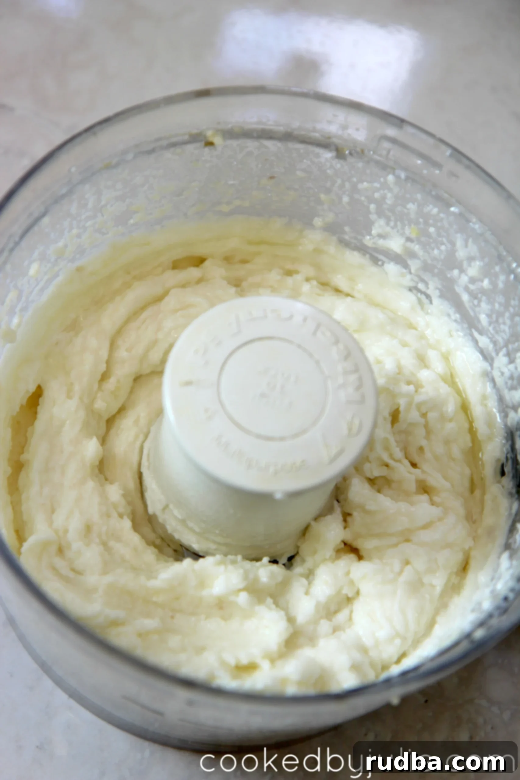 This lebanese garlic sauce comes together in just a quick 5 minutes in the food processor. 
