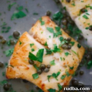 A delectable Cod Piccata dish presented in a skillet.