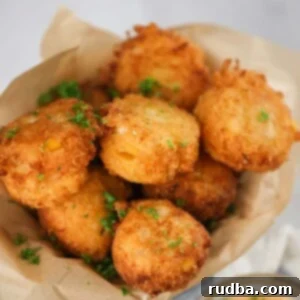 Irresistible Crab Hush Puppies 2 Sweet crab hush puppies with sauce on the side.