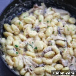 creamy truffle gnocchi in a skillet.