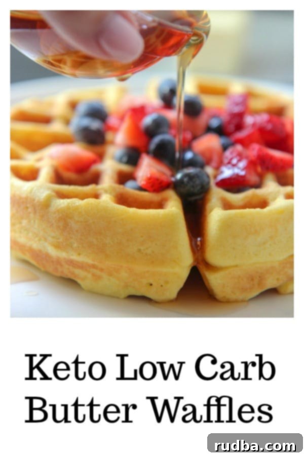 Close-up view of golden Keto Low Carb waffles garnished with fresh fruit for a healthy breakfast