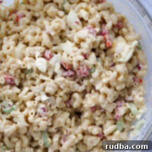 Creamy Macaroni Salad 2 macaroni salad in a large glass bowl.