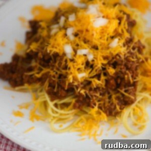 Cincinnati Chili 2 Cincinnati chili on a white plate.