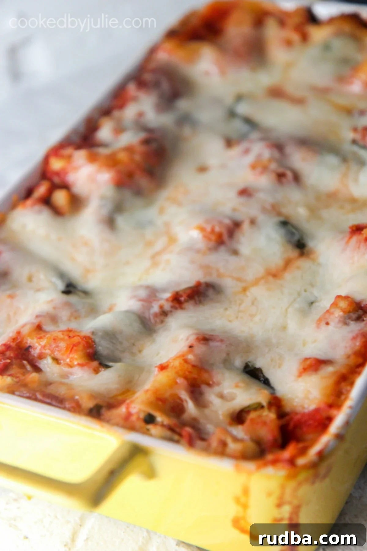 Delicious and cheesy homemade vegetable lasagna baked to perfection with a golden crust