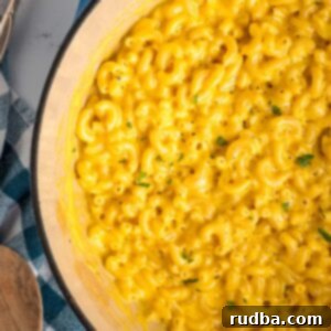 Mac and cheese in a blue dutch oven.