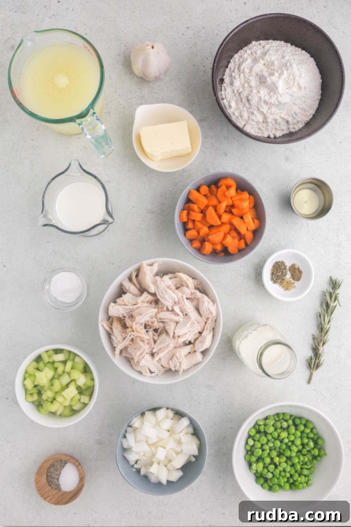 Hearty Homestyle Chicken and Dumplings 3 Measured ingredients on a gray surface.