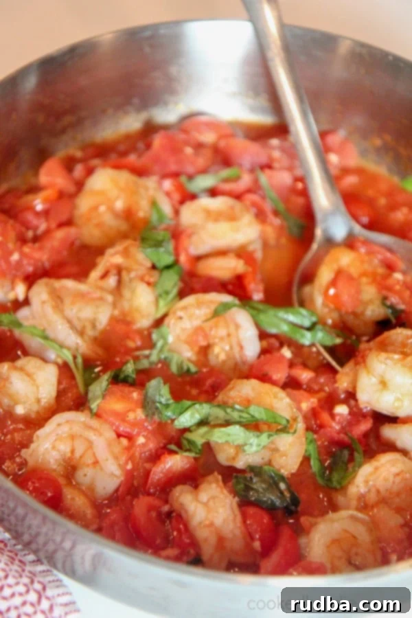 a pot of tomato and basil shrimp