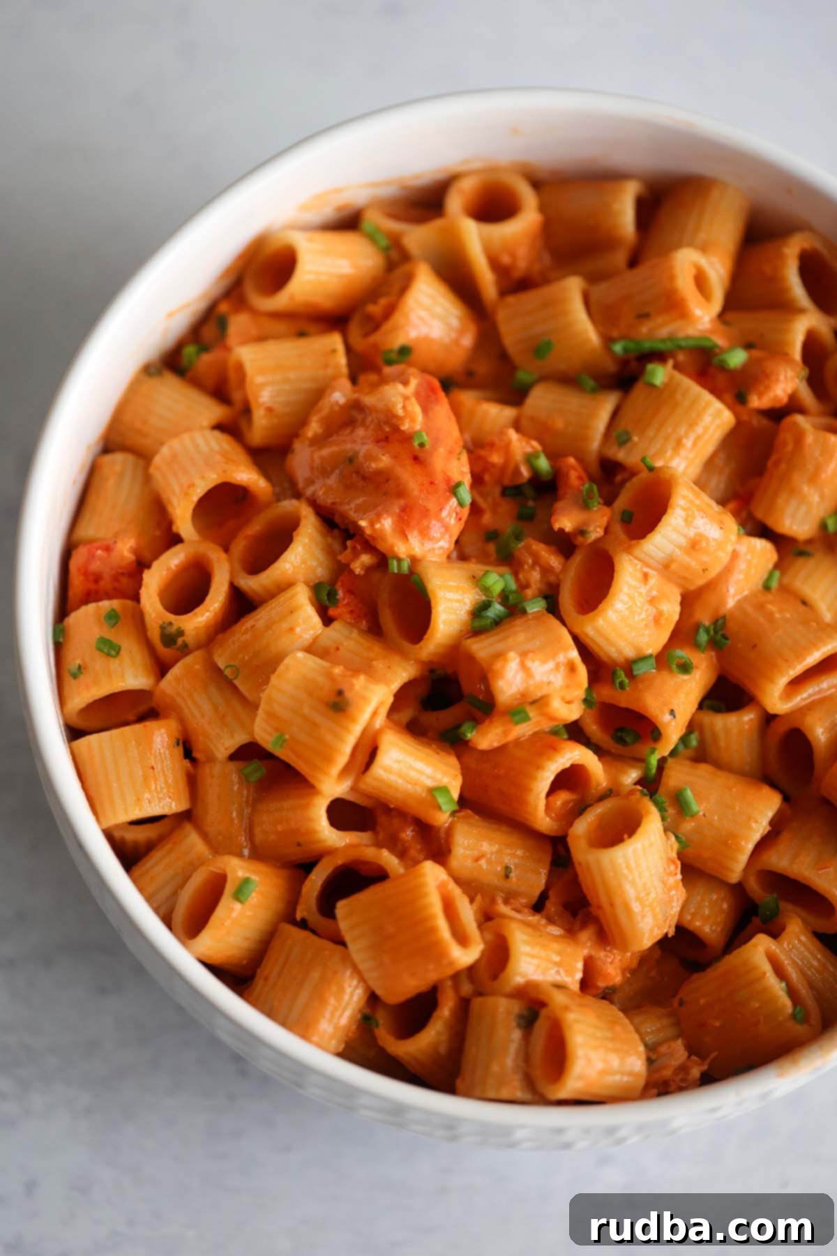 Decadent Lobster Pasta 2 A bowl of creamy lobster pasta, showcasing the rich sauce and tender lobster pieces.