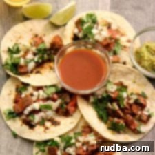Homemade Carne Asada Tacos, prepared with tender marinated steak and fresh toppings.