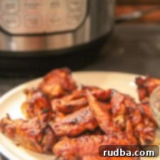 Easy Instant Pot Chicken Wings 6 Crispy Instant Pot chicken wings, perfectly cooked and sauced.