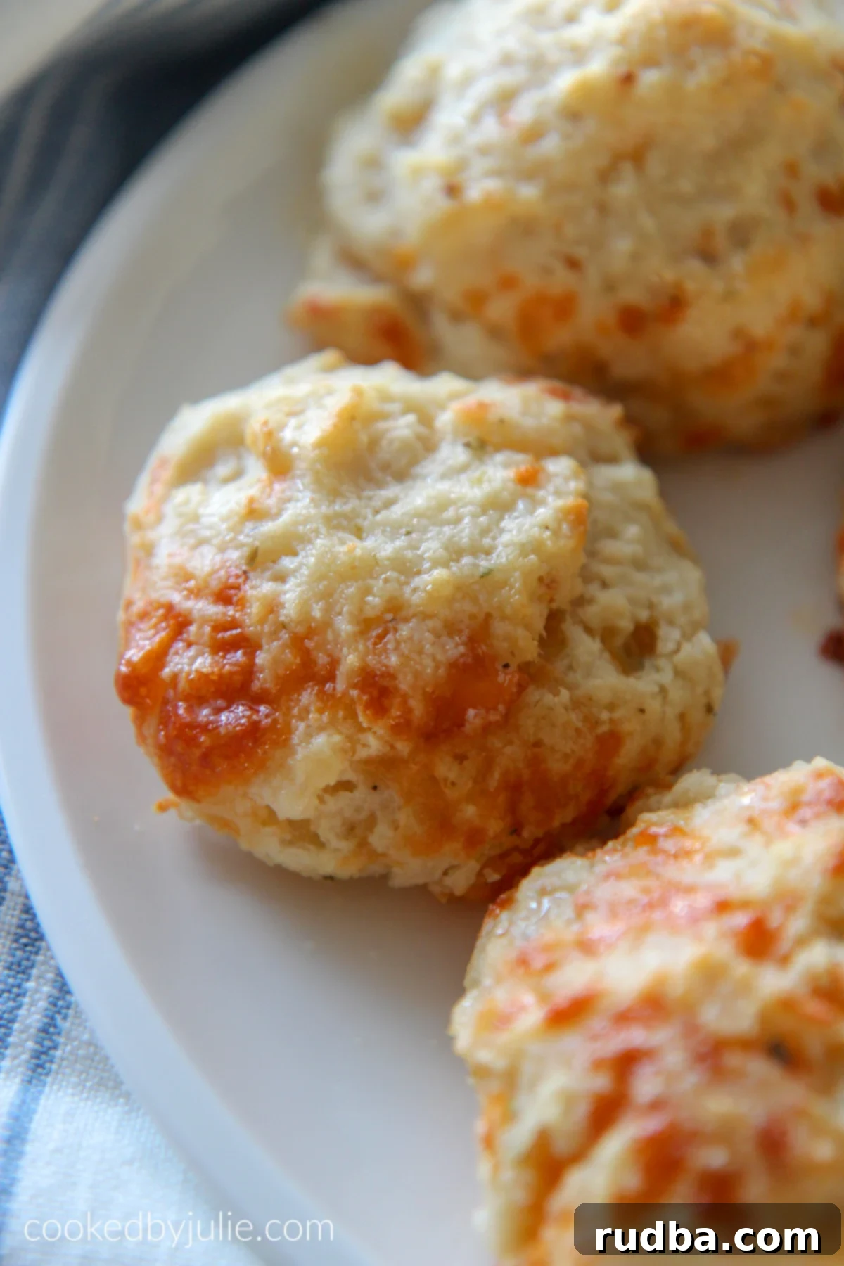 cheese biscuits on a white plate 