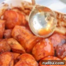 Golden Glazed Yams 2 spoon drizzling candy glaze on the yams